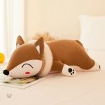 Renard endormi en peluche pour câlins