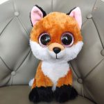 Renard en peluche avec regard charmeur