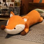 Peluche renard géant roux avec un grand museau