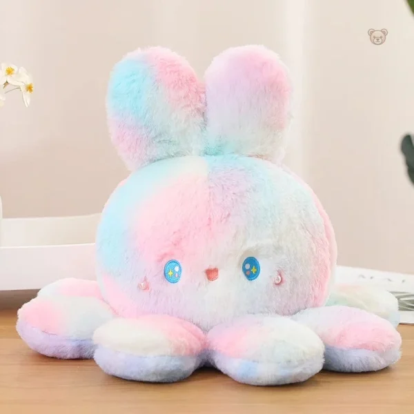 Peluche colorée, réversible avec oreilles moelleuses