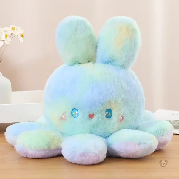 Peluche réversible aux oreilles douces et colorées
