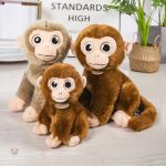 Peluche singe bavard et expressif pour enfants