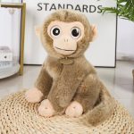 Singe en peluche avec expressions variées et charmantes