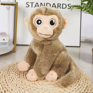 Singe en peluche avec expressions variées et charmantes