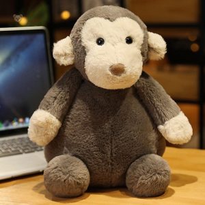 Peluche singe bébé assis douce et câline