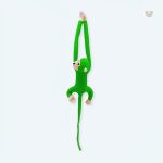 Peluche singe kawaii douce avec longue queue verte