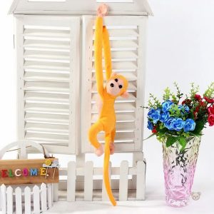 Singe marron en peluche douce, parfait pour les câlins d'enfants