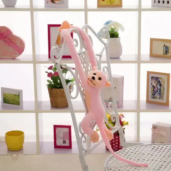 Doux singe en peluche kawaii rose, parfait pour les câlins