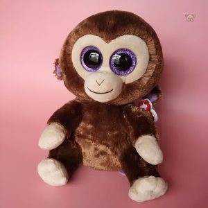Peluche amusante en forme de singe, parfaite pour jouer et câliner