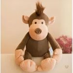 Singe marron en peluche, jouet tendre pour petits aventuriers