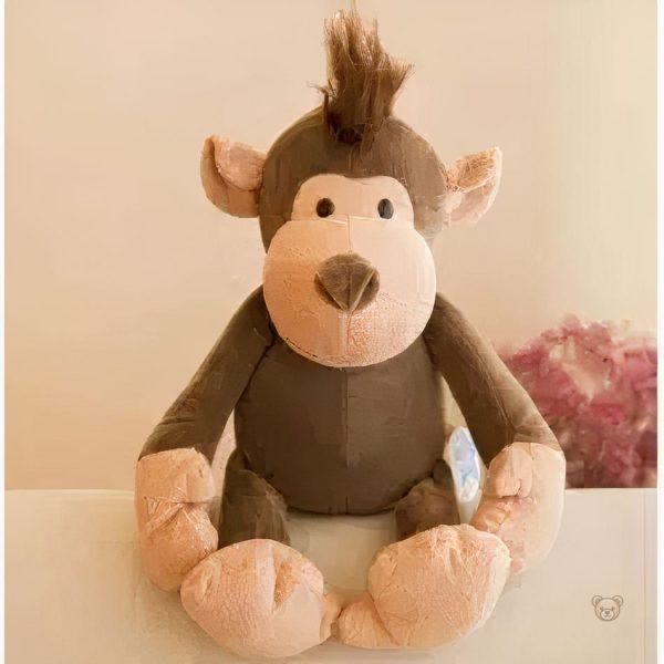 Singe marron en peluche, jouet tendre pour petits aventuriers