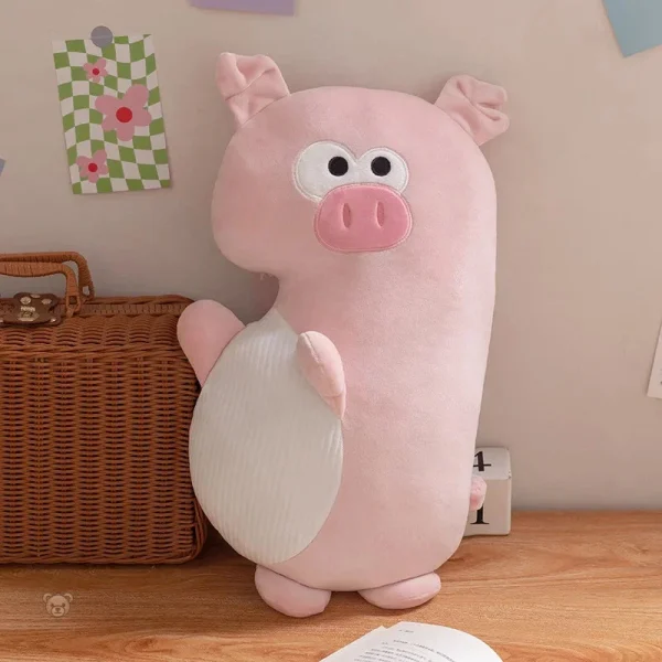 peluche-squishmallow-cochon-bagarreur-1 Peluche squishmallow cochon bagarreur en position assise