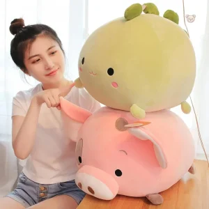 Peluche verte en forme de dinosaure, idéale pour les enfants