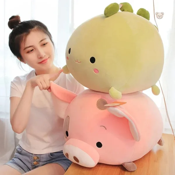 Peluche verte en forme de dinosaure, idéale pour les enfants
