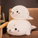 Peluche Squishmallow phoque blanc souriant