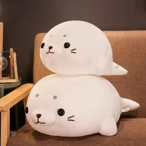 Peluche Squishmallow phoque blanc souriant
