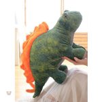 Doux dinosaure en peluche pour un confort enfantin