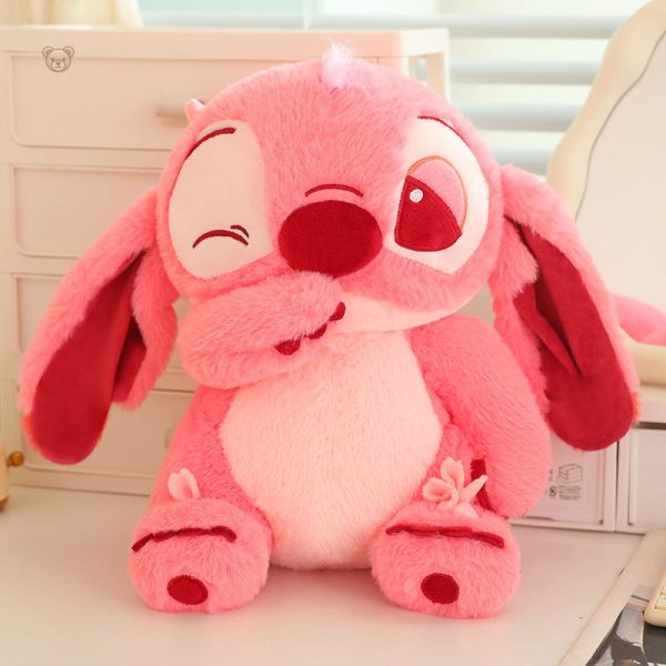 peluche-stitch-angel-rose-douce-et-mignonne-avec-clin-doeil-1 Peluche Stitch Angel rose douce avec clin d'œil