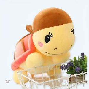 Peluche tortue rose avec casquette amusante