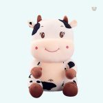 Peluche vache bébé souriante