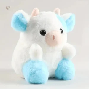 Vache en peluche bleue et blanche, parfaite pour les câlins