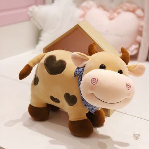 Vache en peluche tendre, idéale pour les câlins d'amour
