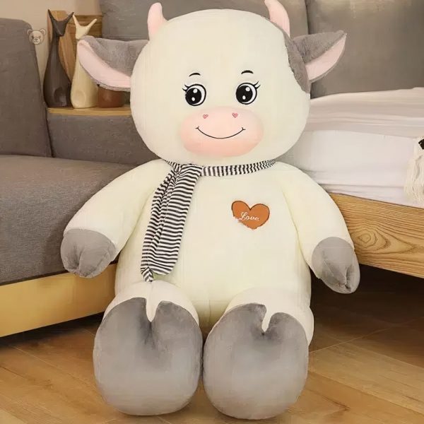 Vache en peluche câline, idéale pour les câlins et les jeux d'enfants