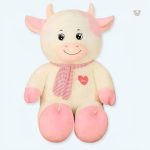 Peluche géante vache douce en rose et blanc pour enfant