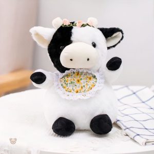 Vache en peluche élégante, idéale pour les câlins d'enfants