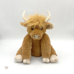 Peluche vache marron douce et câline pour les enfants