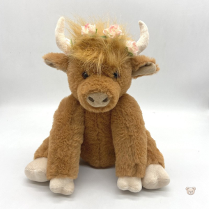Peluche vache marron avec couronne de fleurs