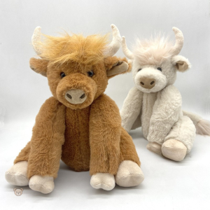 Vache highland en peluche décorée de fleurs colorées