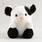 Peluche vache douce noire et blanche, mignonne et câline